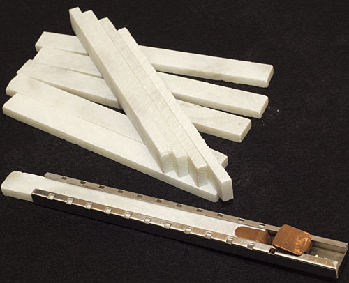 Sticks of French chalk and holder