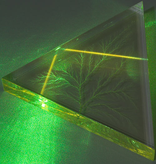 Laser beam through Lichtenberg figure