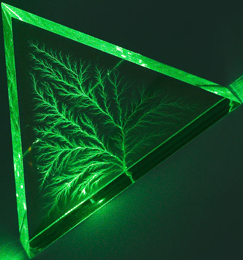 Laser beam through Lichtenberg figure